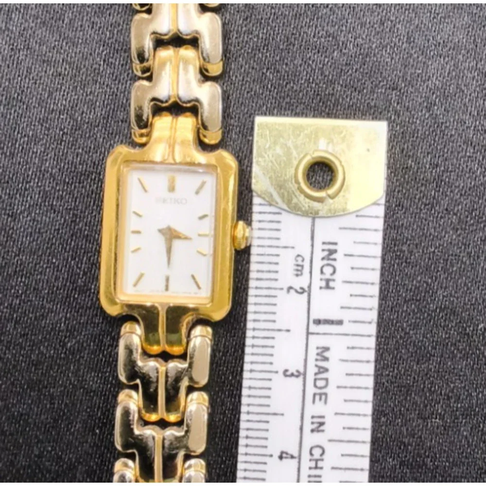 Vintage Seiko 1N00-6T10 Women's Watch Rectangle Gold Tone White Face #W5165